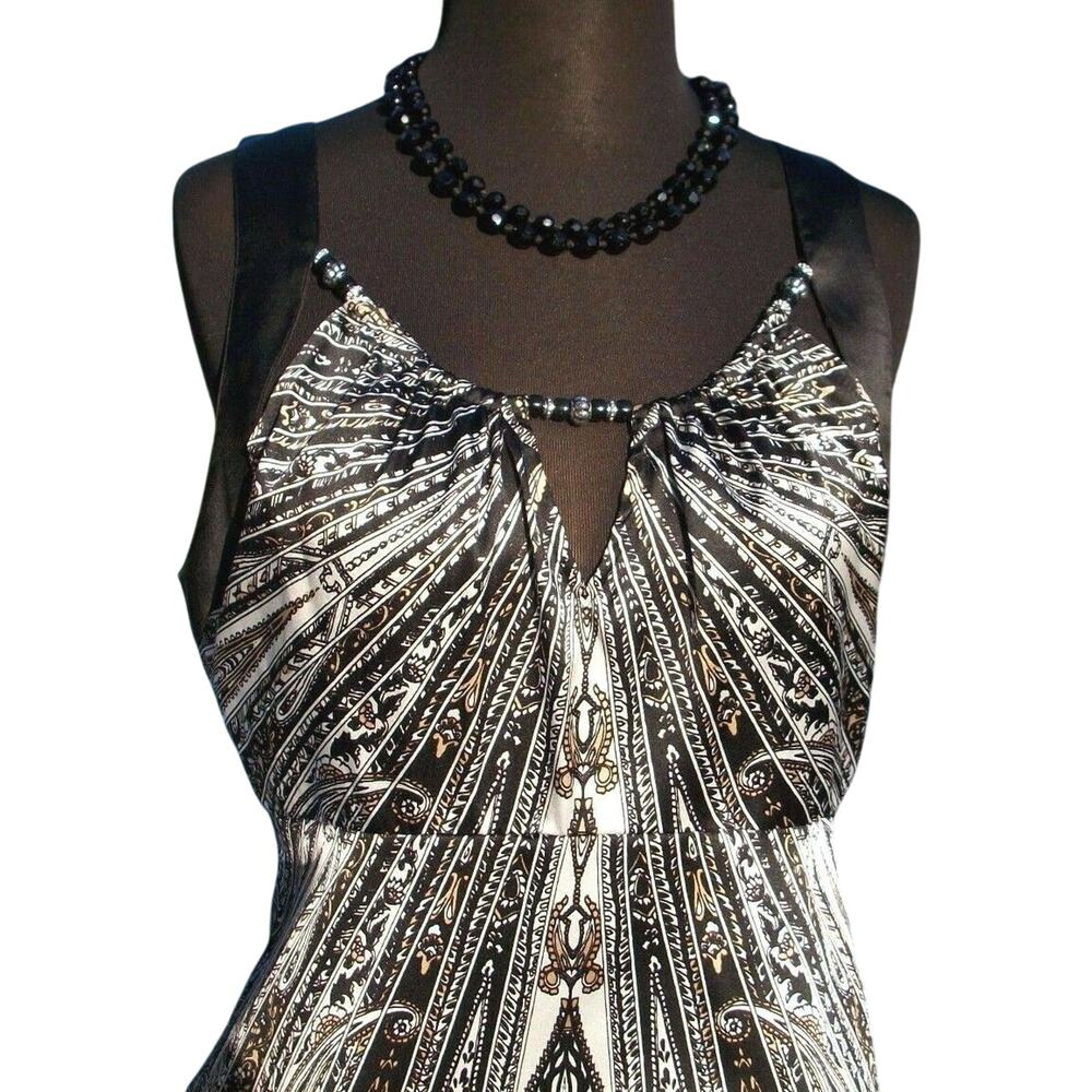 Cache Black Beaded Cut In Sleeve Top Silk Key Hole Front Back Stretch NWT $128